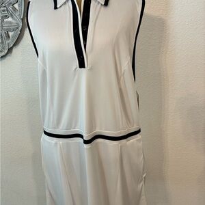 Sleeveless White Dress with Navy Trim, side zip pockets. Wicking? UPV 50
